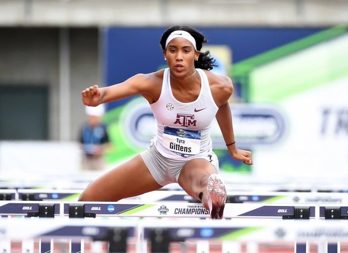 02_texas_am_gittens_improve_tt_record.jpg