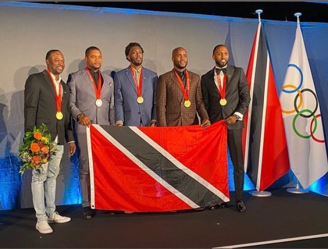 05_tt_relay_men_receive_olympic_gold_14_years.jpg