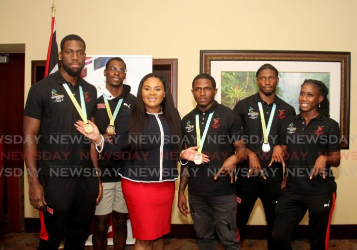 12_tt_runner_sthillaire_honoured_commonwealth_mile_relay_gold.jpg