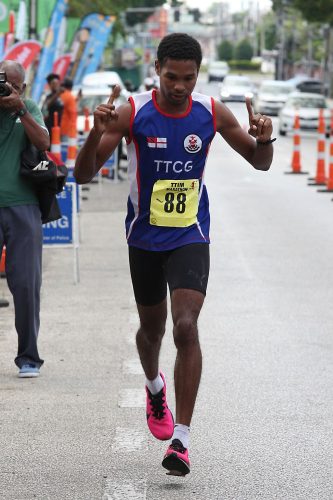 27_kenya_njoroge_mugo_win_tt_marathon_titles.jpg