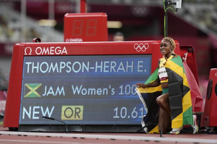 31_thompson_herah_repeats_100m_champion_record_time.jpg